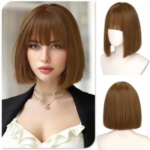 Straight auburn bob wig with curtain bangs on a model